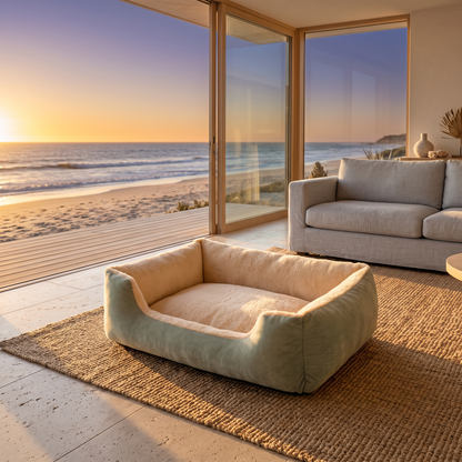 Soft cushioned cloud cat bed on a jute rug in golden light